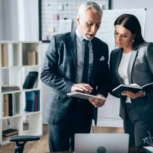 depositphotos_437811052-stock-photo-investor-using-digital-tablet-businesswoman